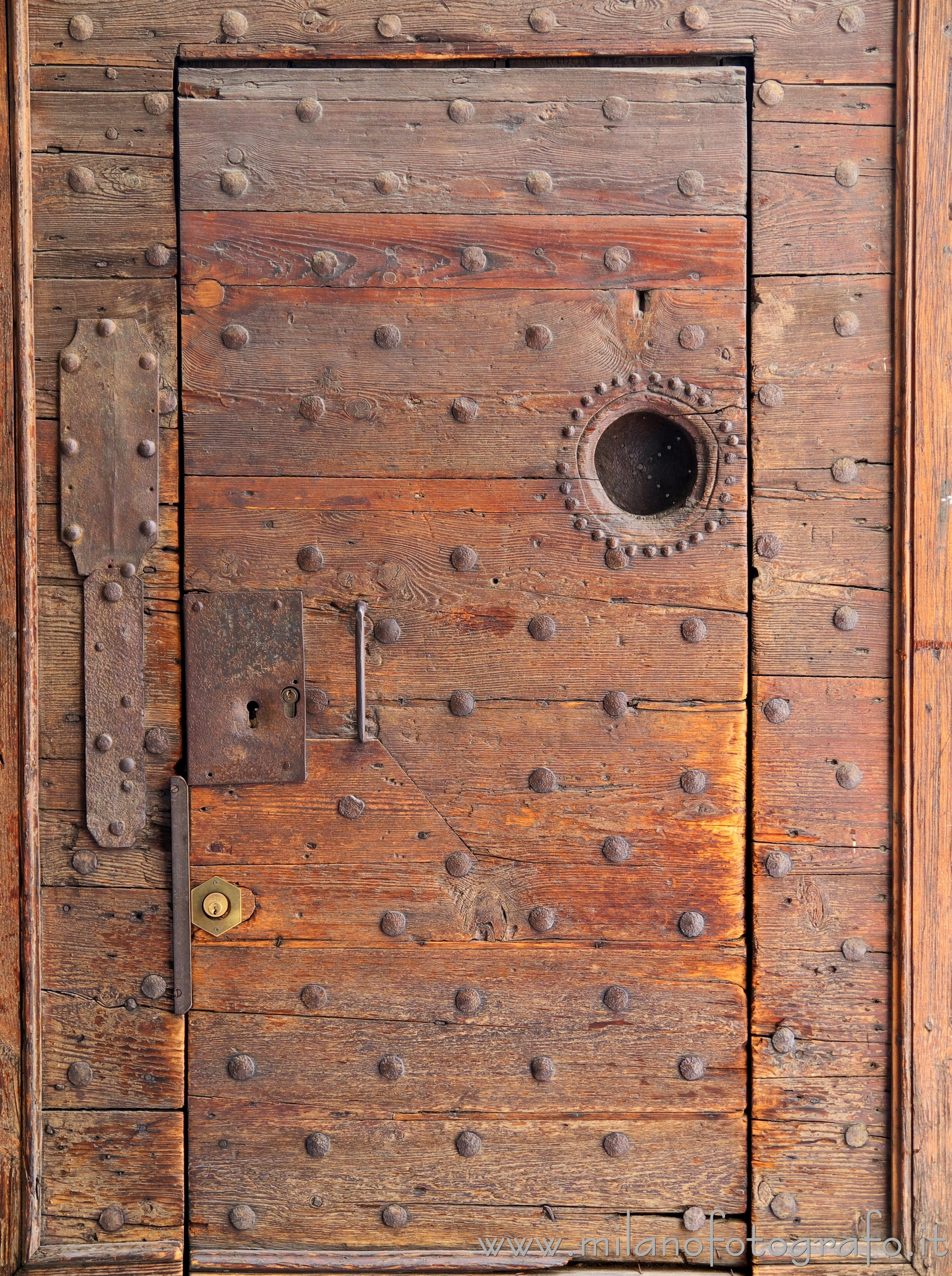 Milan (Italy) - Pedestrian door to the court of the Church of Santa Maria del Carmine